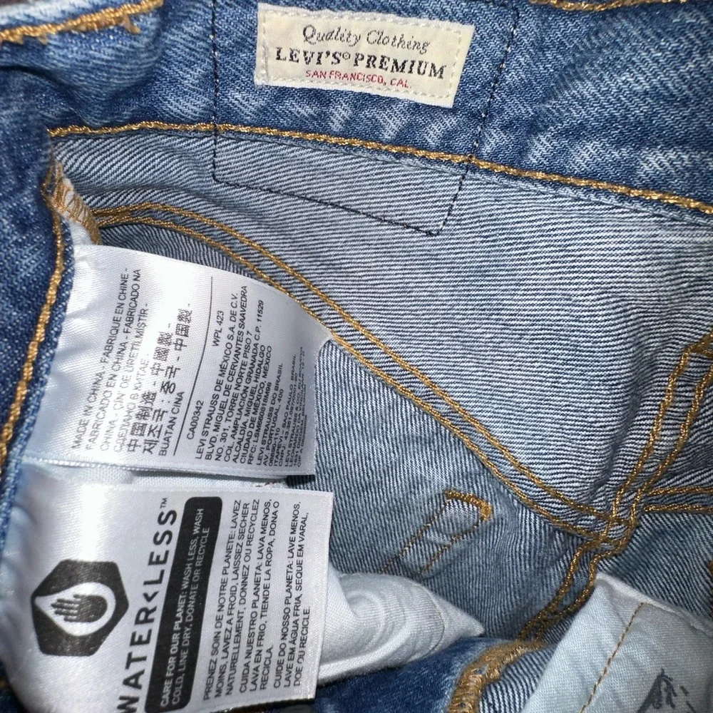 Levi's premium denim button fly Distressed Blue 501 Jean Shorts 25